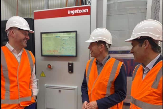 Chief Minister Andrew Barr and Shane Rattenbury, Minister for Water, Energy and Emissions Reduction, switch on the new battery. Photo: ACT Government