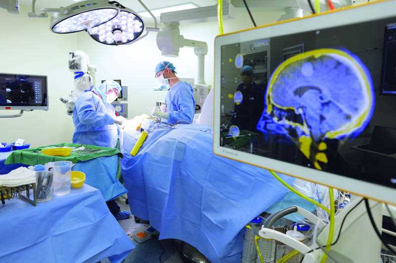 medical professionals performing neurosurgery at the Ramsay Health Care-operated Greenslopes Private Hospital in Brisbane