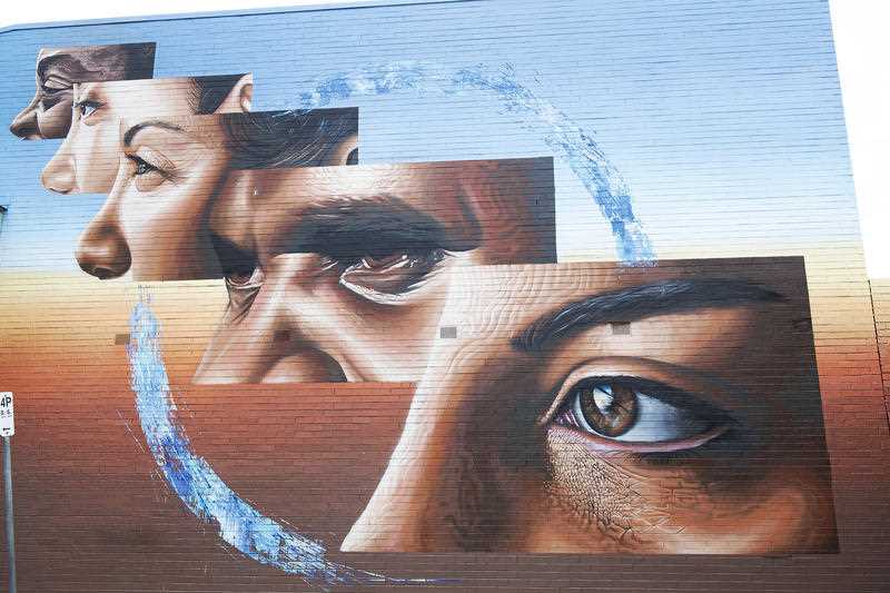 a graffiti mural that promotes racial tolerance