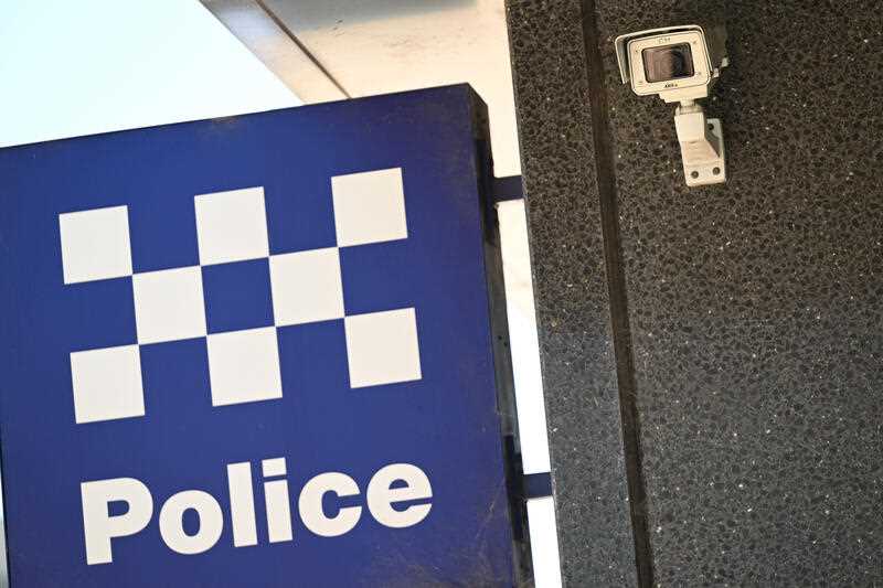 A NSW Police sign and security camera