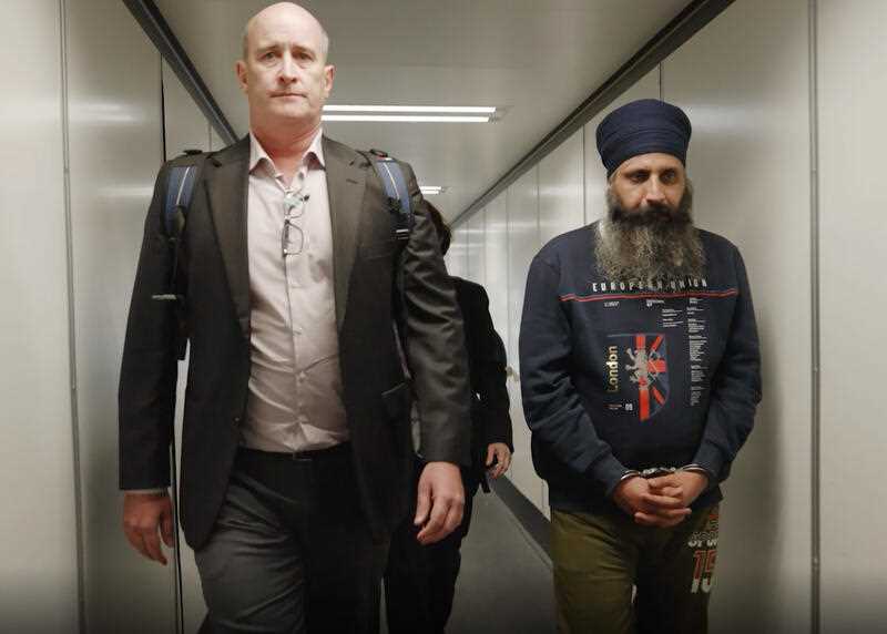 Rajwinder Singh, 38, arriving in Melbourne after he was extradited from India over his alleged involvement in the death of Queensland woman Toyah Cordingley