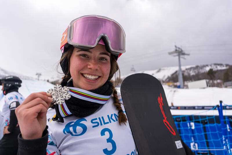 Australian snowboard cross racer Josie Baff posing for a photograph after winning silver in the Snowboard Cross event during the 2023 FIS Snowboarding World Championships in Bakuriani, Georgia, Wednesday, March 1, 2023
