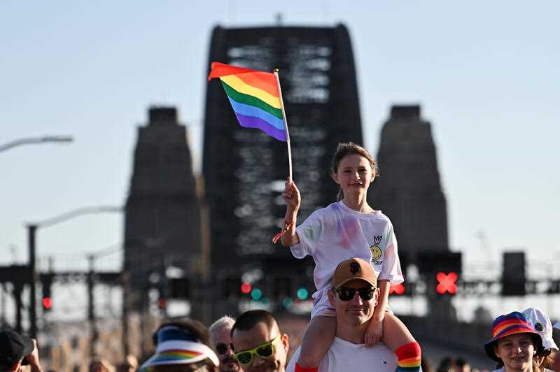 People march across the Sydney Harbour Bridge for equality as part of the 2023 WorldPride festival in Sydney, Sunday, March 5, 2023
