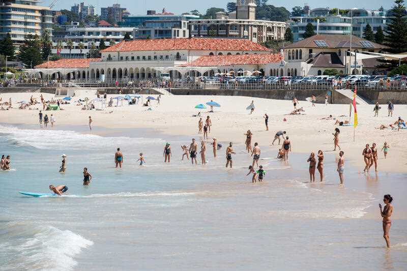 Beachgoers at Bondi Beach in Sydney, in sweltering conditions