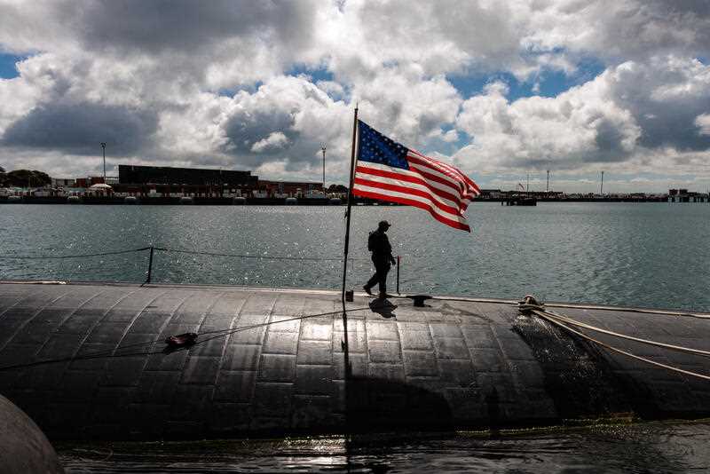 A crew member is seen onboard the USS Asheville, a Los Angeles-class nuclear powered fast attack submarine at HMAS Stirling in Perth, Thursday, March 16, 2023