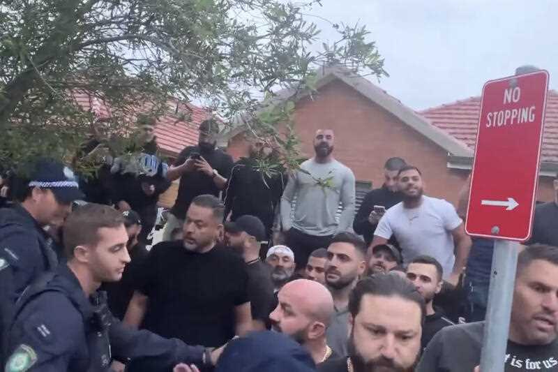 A supplied screengrab taken from video footage obtained on Wednesday, March 22, 2023, of a violent street protest outside St Michael's Church in Belfield, Sydney where One Nation leader Mark Latham was scheduled to give a speech on Tuesday, March 22, 2023