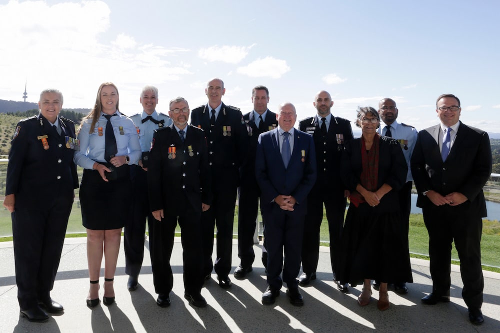 Mick Gentleman, Mick Gentleman, ACT Minister for Police and Emergency Services, and the recipients of the Community Protection Medals. Photo: ACT Government