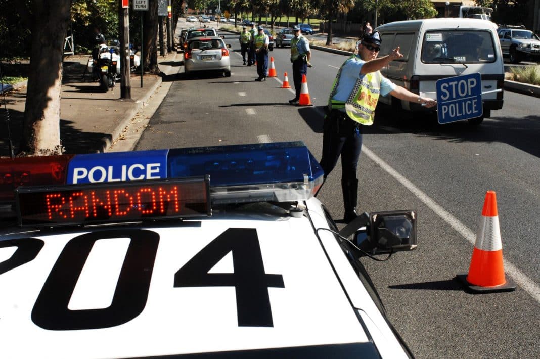 NSW Police conduct a random breath test operation on Moore Park Road, Sydney