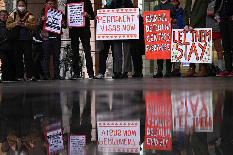 Refugees and supporters rally outside the Immigration Department in Melbourne, Wednesday, August 24, 2022