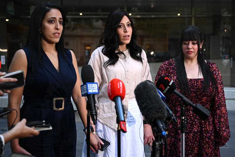 3 sisters - Elly Sapper, Nicole Meyer and Dassi Erlich speak to media outside the County Court of Victoria in Melbourne, Monday, April 3, 2023