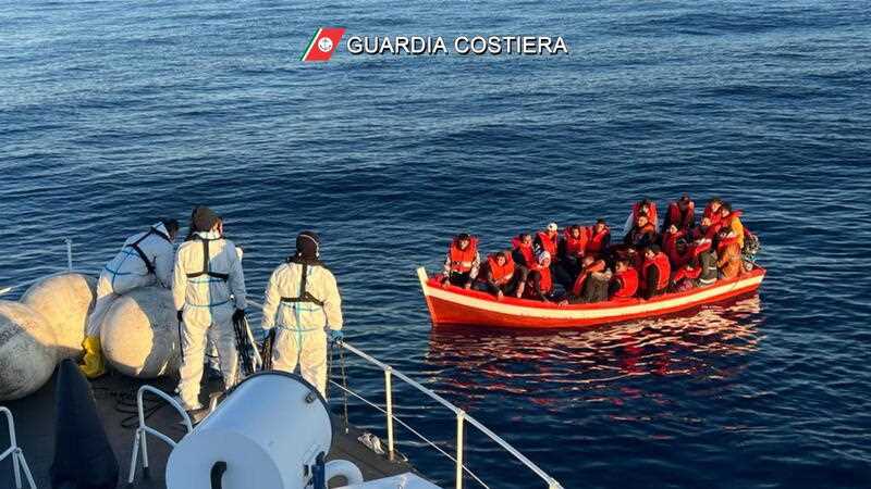 Italian Coast Guard rescuing migrants in Ionian Sea of the Mediterranean, close to Sicily and Calabria, Italy, 10 April 2023