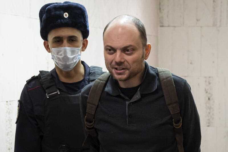 Russian opposition activist Vladimir Kara-Murza is escorted to a hearing in a court in Moscow, Russia, Feb. 8, 2023
