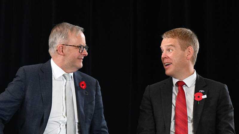 Australian Prime Minister Anthony Albanese (left) and New Zealand Prime Minister Chris Hipkins (right) are seen at a Australian Citizenship Ceremony at the South Bank Piazza during a visit to Brisbane, Sunday, April 23, 2023