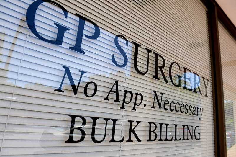 A GP surgery sign offering bulk billing is seen in Sydney