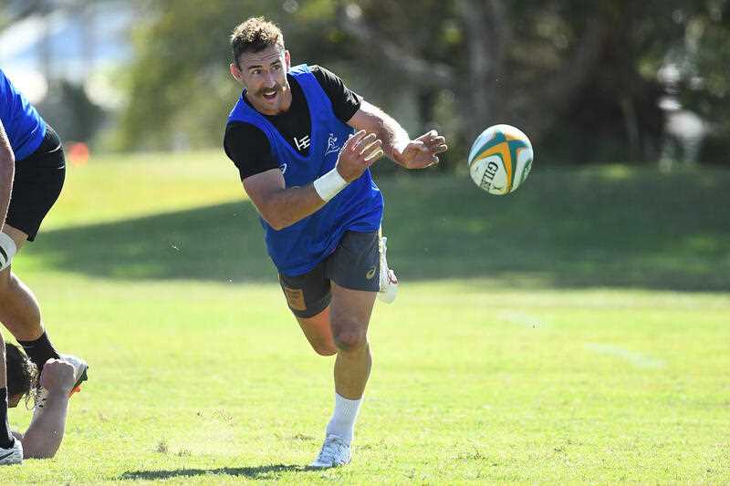 Nic White passes the ball during an Australian Wallabies training session