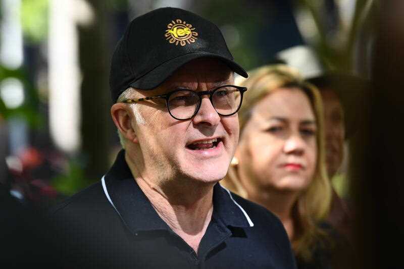 Australian Prime Minister Anthony Albanese speaks while wearing a “Yes” hat ahead of the May Day march, as part of Labour Day, in Brisbane, Monday, May 1, 2023.