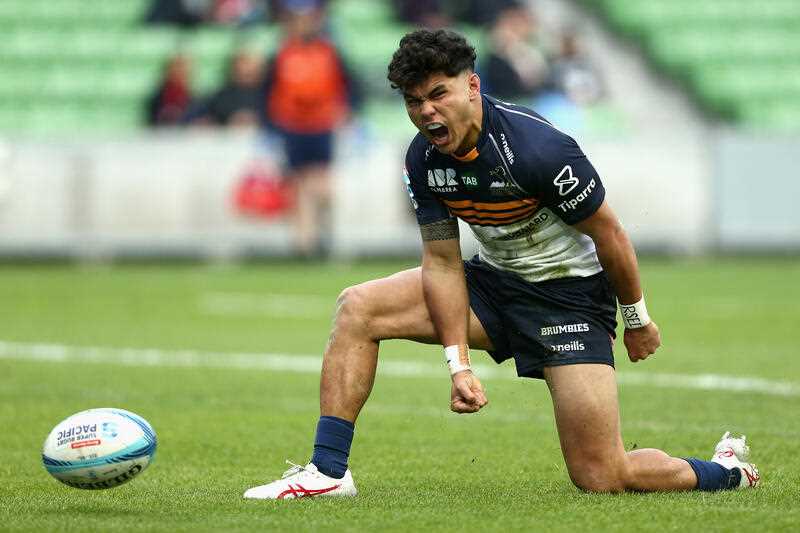 Noah Lolesio of the Brumbies celebrates a try during the Super Rugby Pacific Round 11 match between the Melbourne Rebels and the ACT Brumbies at AAMI Park in Melbourne, Sunday, May 7, 2023