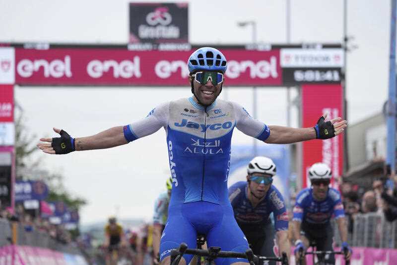 Australia's Michael Matthews crosses the finish line to win the third stage of the Giro d'Italia cycling race from Vasto to Melfi, Italy, Monday, May 8, 2023.
