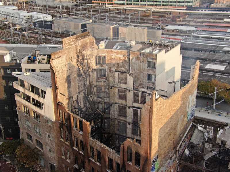 the remains of a building that went up in flames in Sydney