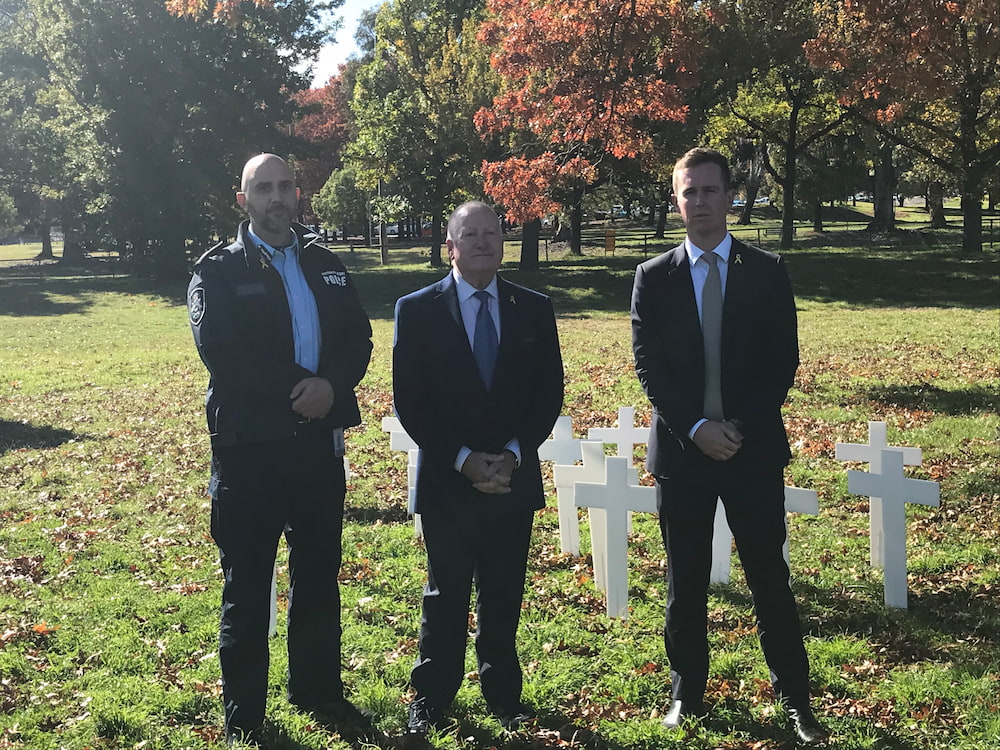 Deputy Chief Police Officer Doug Boudry and ACT ministers Mick Gentleman and Chris Steel. Photo: Nick Fuller