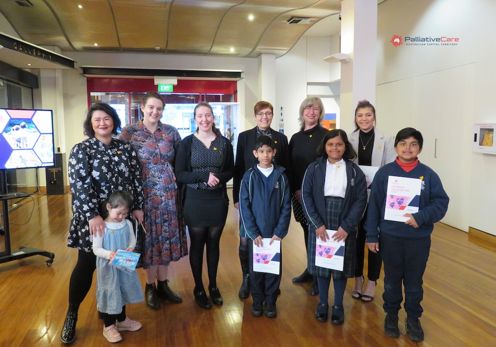 Tracy Gillard, Palliative Care ACT interim CEO, and ACT health minister Rachel Stephen-Smith, with guests at the launch of the palliative care toolkit. Photo provided