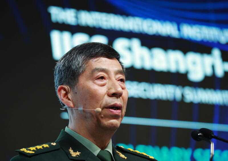Chinese State Councilor and Minister of National Defence General Li Shangfu delivers his speech during a plenary session of the International Institute for Strategic Studies (IISS) Shangri-la Dialogue at the Shangri-la hotel in Singapore, 04 June 2023
