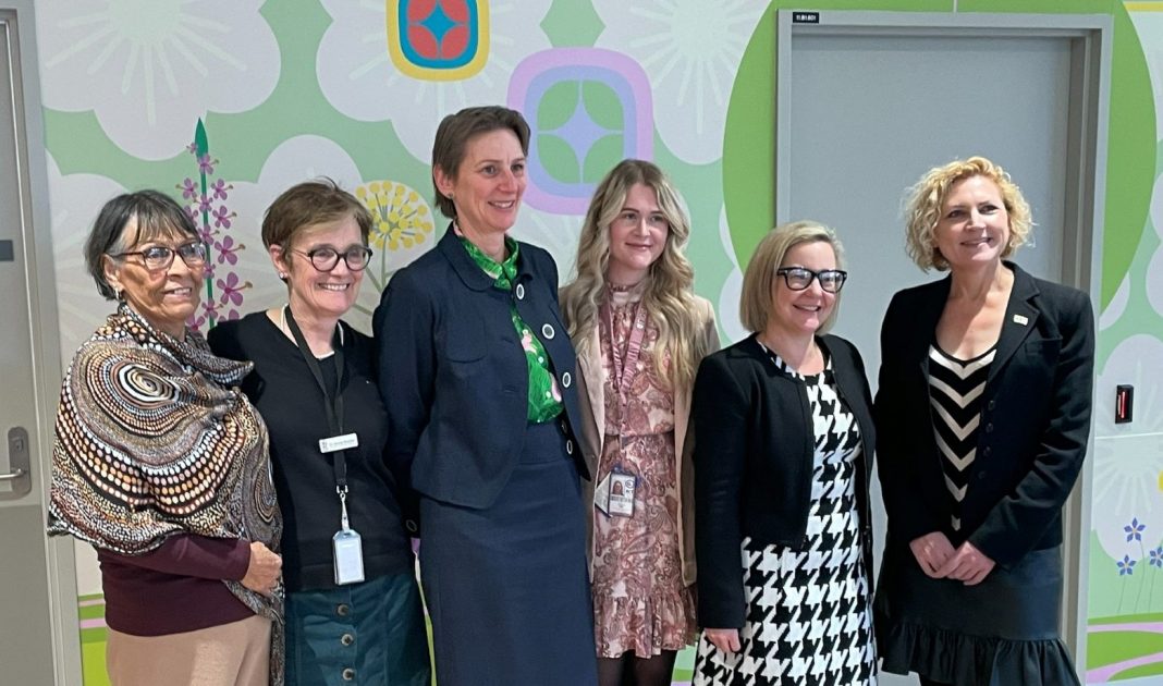 6 professional women posing for photo at opening of new youth mental health service in the ACT