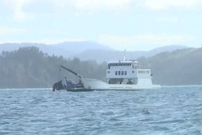 A supplied screen-grab from a Nine News video obtained Sunday, July 30, 2023 of what is believed to be debris from the MRH90 Taipan being hauled from the water off Lindeman Island.