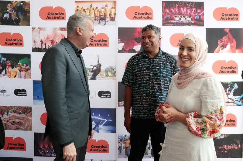 Arts Minister Tony Burke with performers(L-R) Fred Leone and slam poet Sara Mansour during the launch for Creative Australia, an expanded and modernised Australia Council for the Arts, at the The Sydney Theatre Company in Sydney