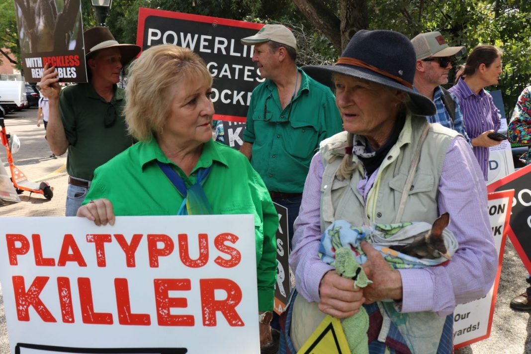 2 middle aged women at a rally against renewables in Brisbane