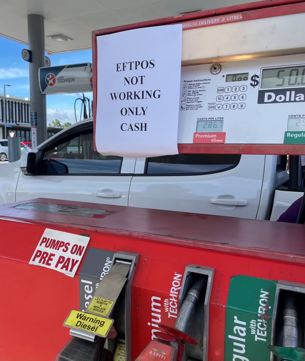 Cash Only sign at petrol station after a natural disaster in New Zealand