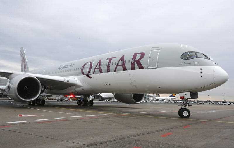 a Qatar Airways Airbus A350 on the tarmac