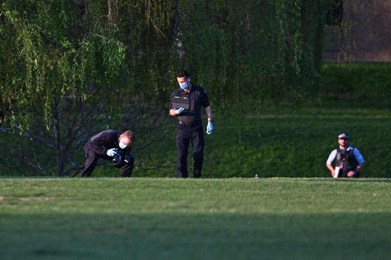 Police forensics officers work at a crime scene at the Australian National University (ANU) in Canberra, Monday, September 18, 2023