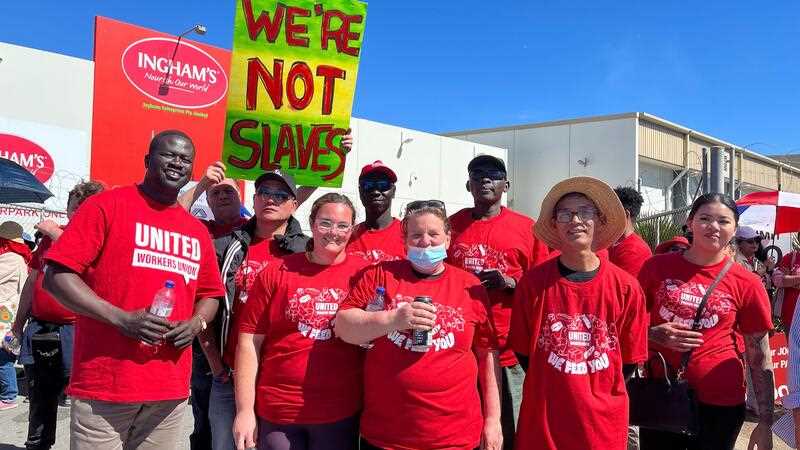 Workers hold a picket line in front of the Inghams Bolivar plant in northern Adelaide, South Australia, Friday, September 22, 2023