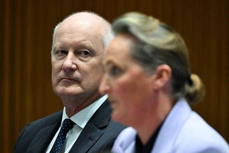 Qantas Chairman Richard Goyder reacts during the Select Committee on Commonwealth Bilateral Air Service Agreements at Parliament House in Canberra, Wednesday, September 27, 2023.