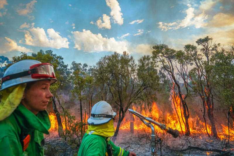 firefighters battling a bushfire in Australia