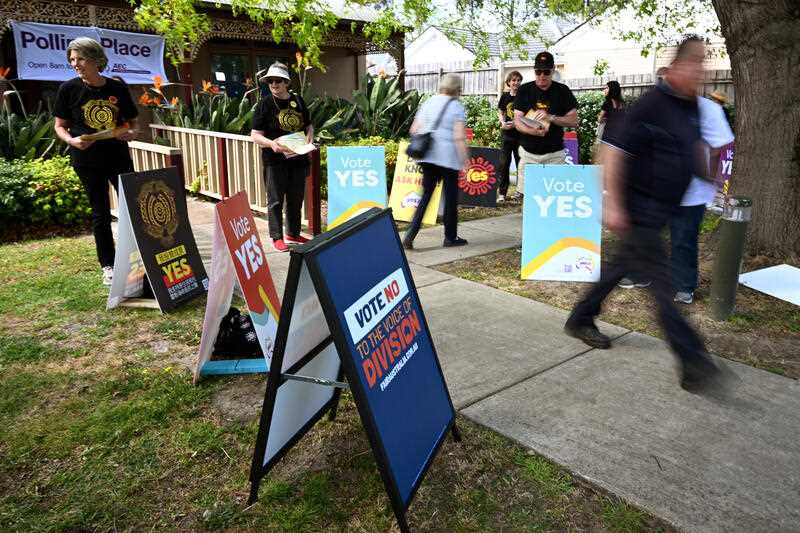 Vote Yes and Vote No signage at an early voting centre for the Indigenous voice to parliament referendum in Melbourne, Monday, October 2, 2023