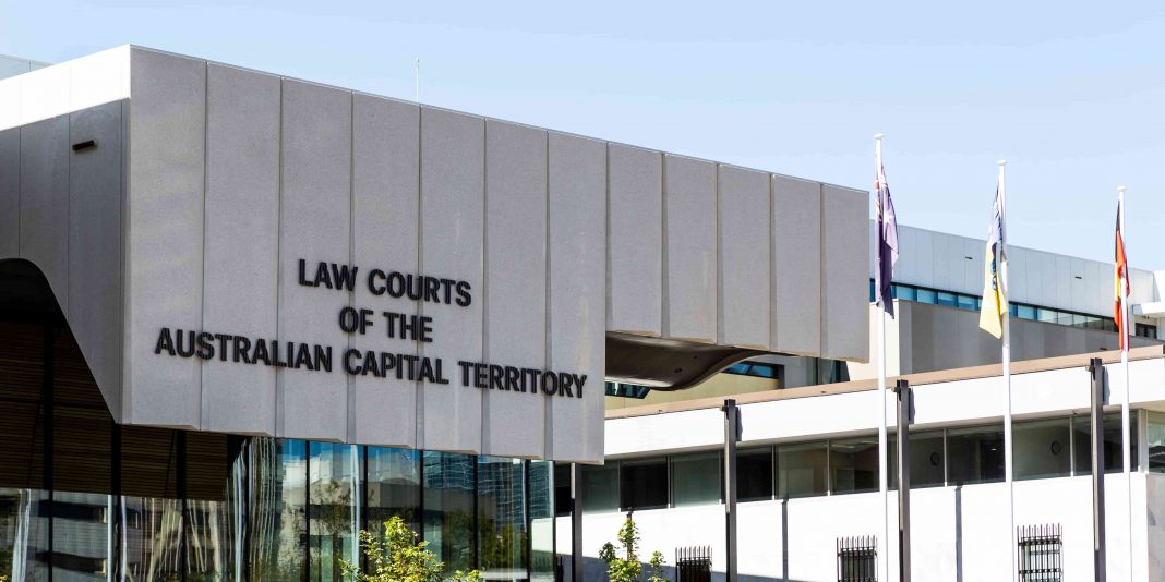 exterior of contemporary concrete and glass ACT Law courts building