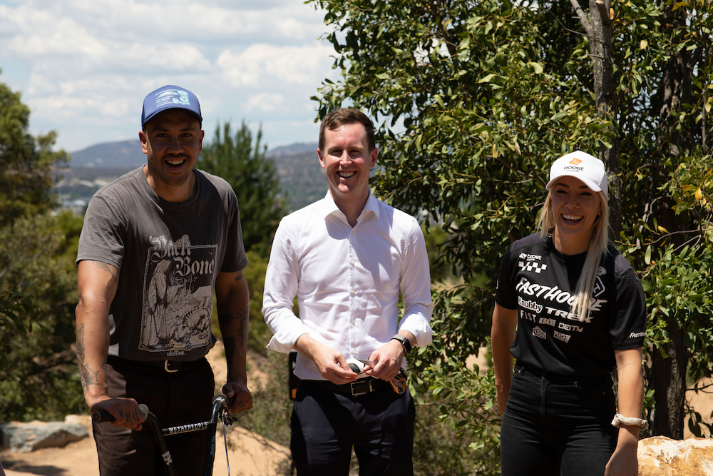 Tyson Jones-Peni, president of the Freestyle ACT BMX Club; Chris Steel MLA, Special Minister for State; and Caroline Buchanan, world champion cyclist. Photo: ACT Government