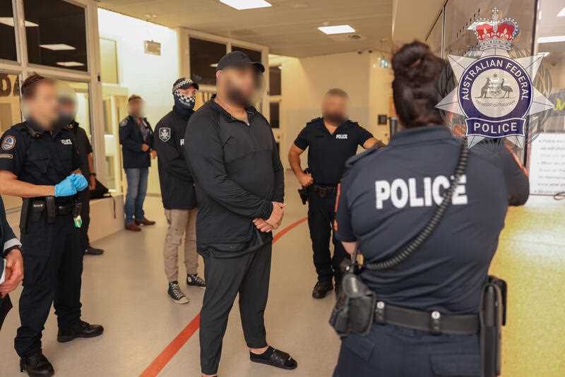 a 28-year-old alleged senior Alameddine gang member Masood Zakaria who was deported by Turkish authorities and landed in Darwin on Sunday, December 3, 2023, where he was arrested by members of the Australian Federal Police (AFP) and charged with a number of organised crime offences.