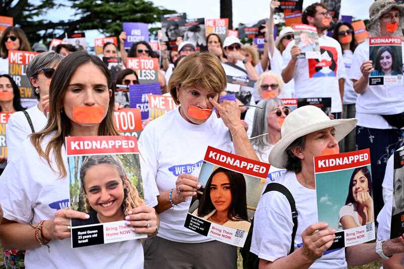 Supporters during a ‘No Excuse for Sexual Violence’ vigil by the women of Melbourne’s Jewish community at Hopetoun Gardens in Melbourne, Monday, December 4, 2023.