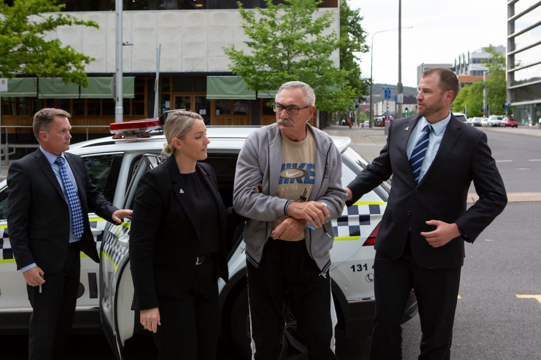 Joseph Vekony (centre) was extradited from Melbourne to be charged with Irma Palasics' 1999 murder. (HANDOUT/ACT POLICING)