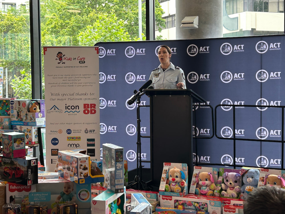 DLSC Alex Uren speaking at Friday's toy handover for Kids in Care. Photo: ACT Policing