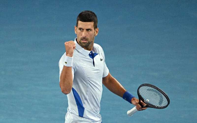 Novak Djokovic of Serbia reacts during his 4th round match against Adrian Mannarino of France on Day 8 of the 2024 Australian Open at Melbourne Park in Melbourne, Sunday, January 21, 2024.