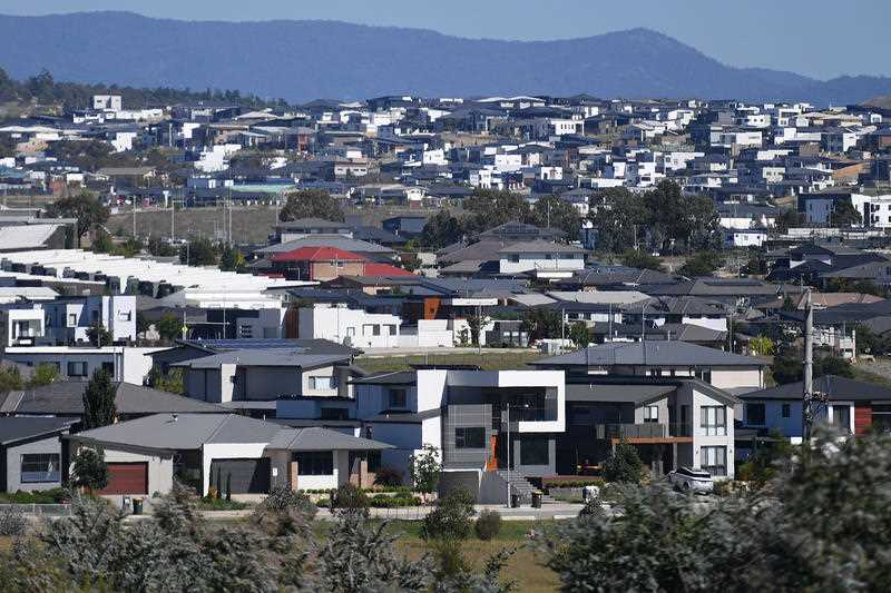 New home buildings are seen on a housing estate in the Canberra suburb of Wright