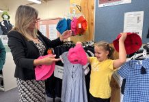 ACT education minister Yvette Berry with Isla, 8, in the Caroline Chisholm School uniform shop. Photo supplied
