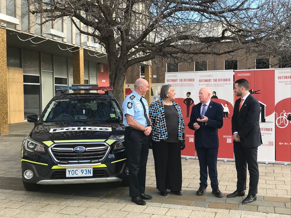 ACT Chief Police Officer Scott Lee, Angela Di Pauli (ACT Neighbourhood Watch), Minister Mick Gentleman, and Oliver Forrester (Crime Stoppers ACT). Photo: Nicholas Fuller