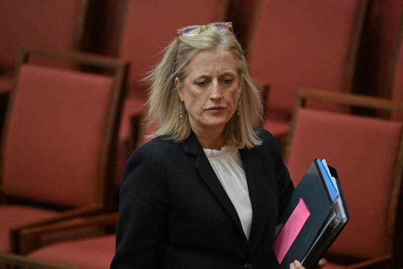 Minister for Finance Katy Gallagher arrives for Question Time in the Senate chamber at Parliament House in Canberra