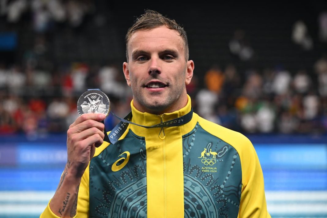 Silver medallist Australian swimmer Kyle Chalmers poses with his medal after the Men's 100m Freestyle Final at Paris La Defense Arena, as part of the 2024 Paris Olympic Games, in Paris, France, Wednesday, July 31, 2024. (AAP Image/Dave Hunt)