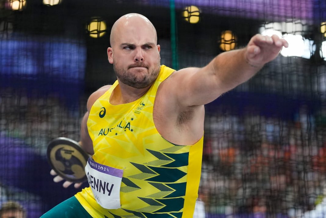 Matt Denny's home circle visions spur historic discus medal